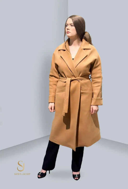 Model wearing a stylish beige jacket, showcasing a tailored fit and belted design, perfect for winter fashion.