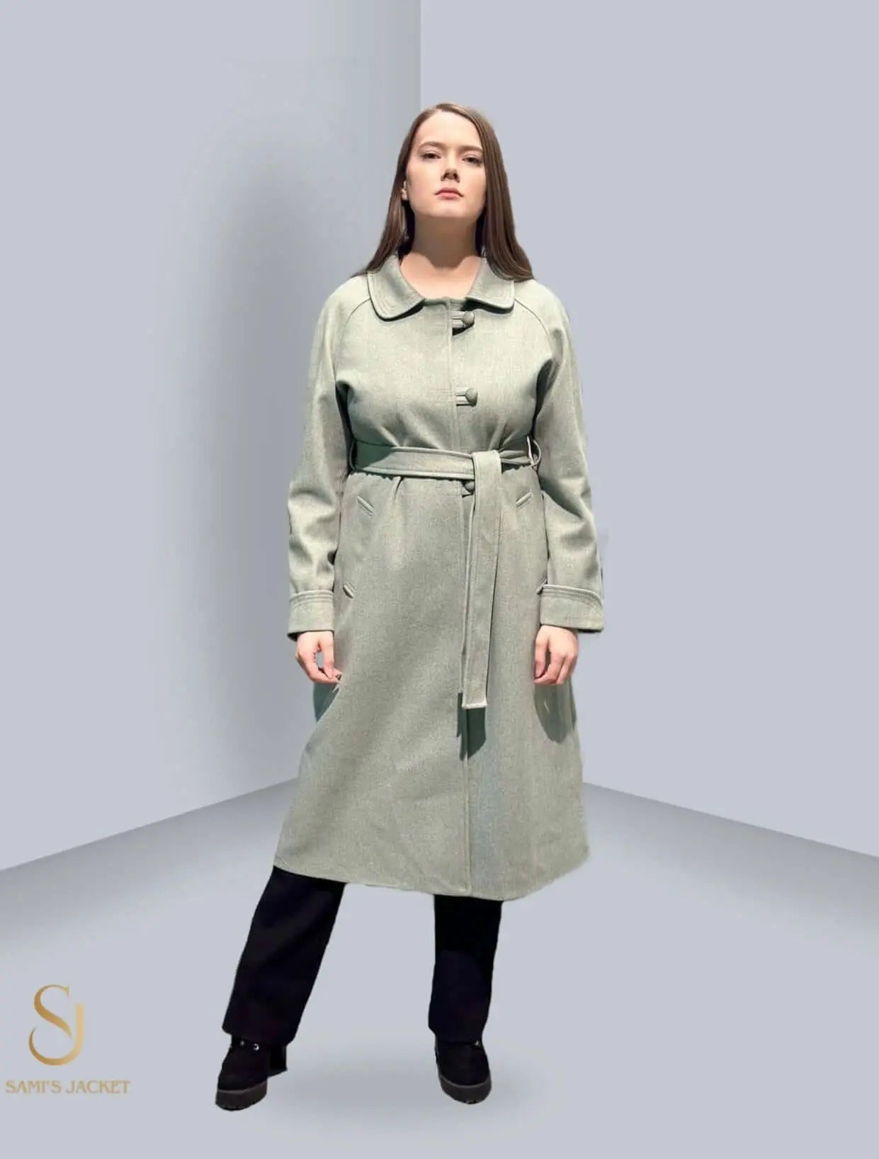 Stylish women's winter jacket in light green, featuring a tailored fit and belted design, perfect for cold weather fashion.