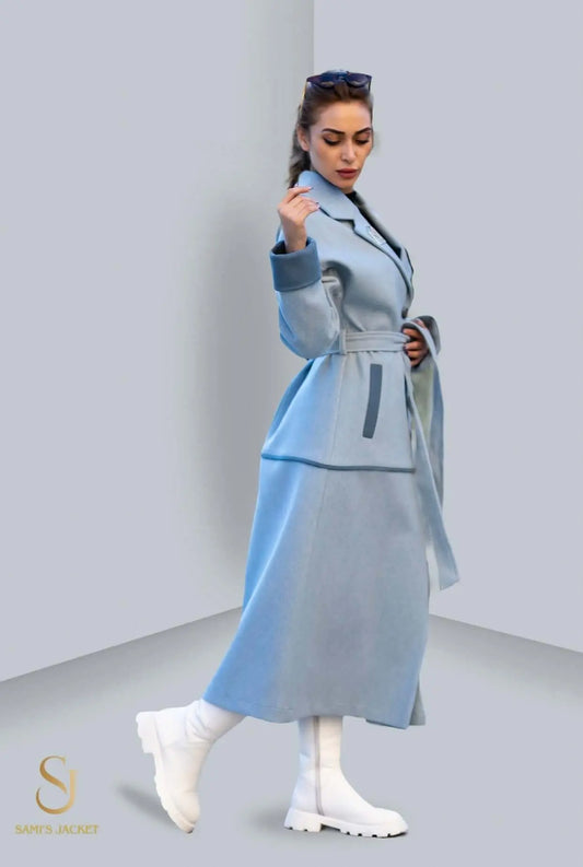 Elegant winter coat Model 1038 in light blue, featuring a belted waist and stylish design, perfect for women's winter fashion.