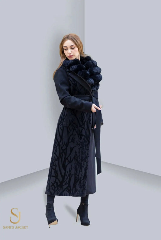 Elegant woman wearing a stylish long winter coat with a fur collar, displaying a sophisticated winter look.