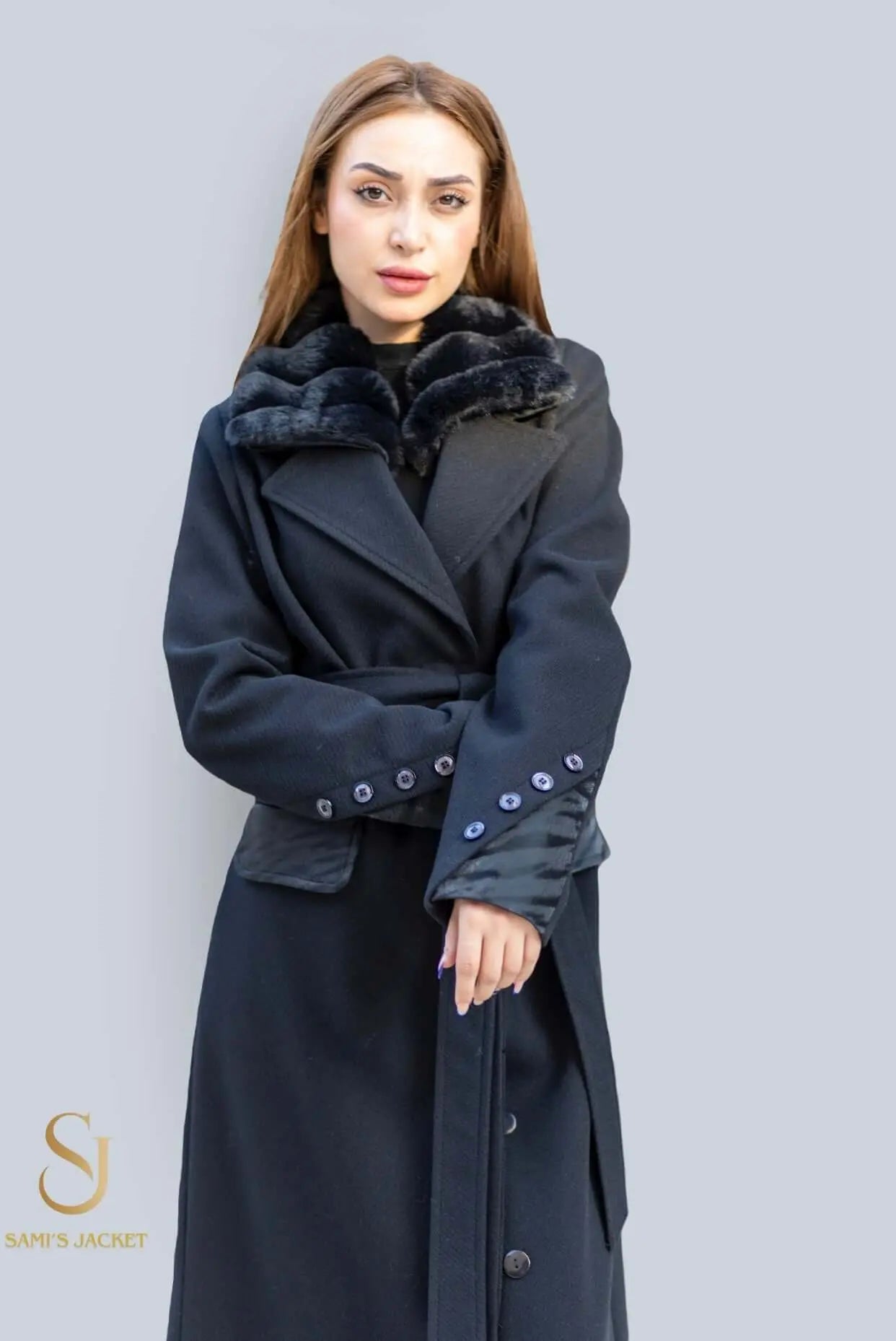 Elegant women's asymmetrical winter coat featuring a stylish fur collar and detailed button accents, ideal for chic winter fashion.