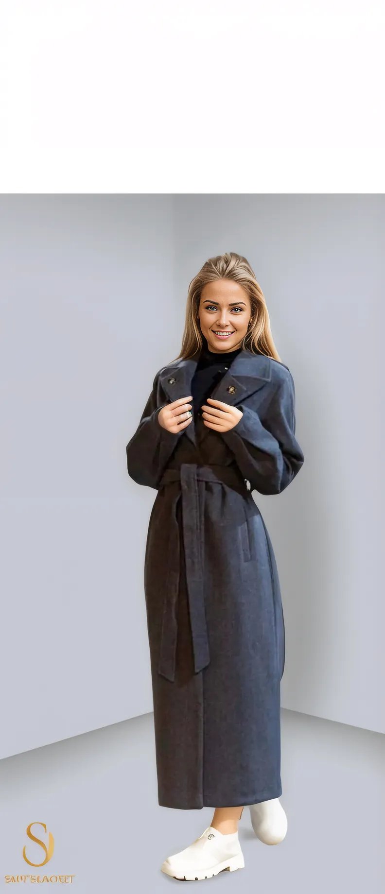 Elegant long winter coat for women in dark gray, perfect for cold weather and stylish layering. Ideal for versatile outfits.