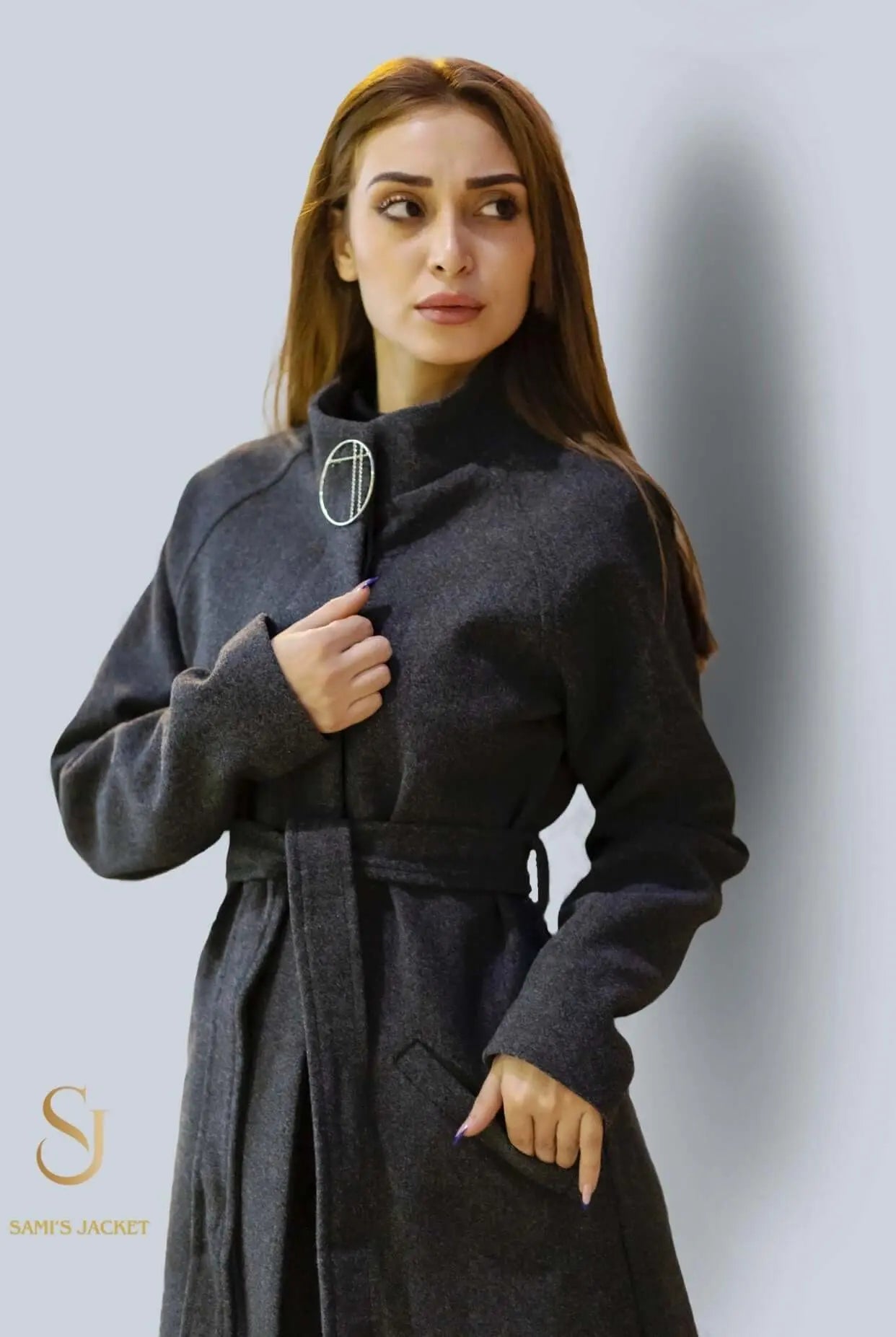 Elegant Model 1037 coat in dark gray, featuring a belted silhouette, ideal for winter fashion for women.