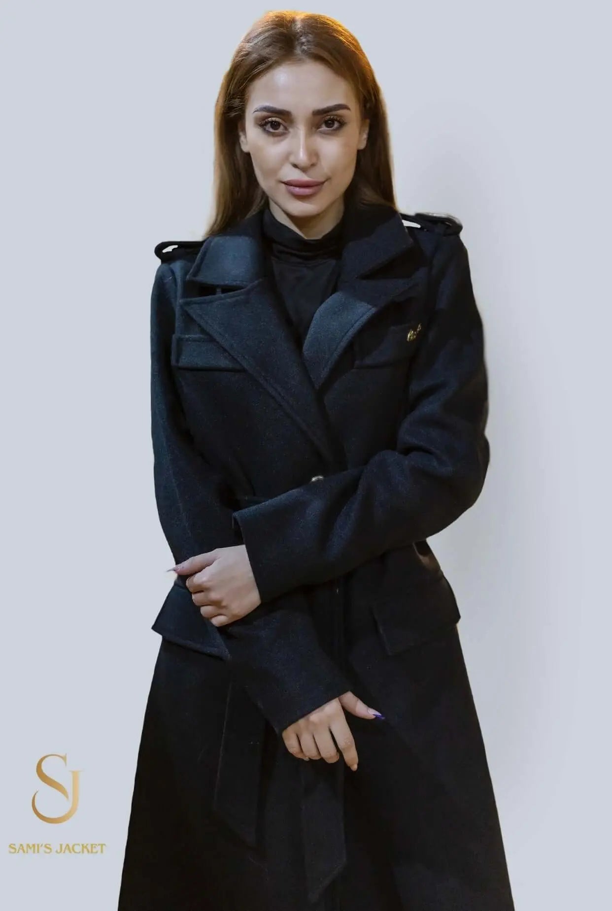 Elegant black winter coat model 1047, perfect for women seeking stylish and warm outerwear for cold weather.