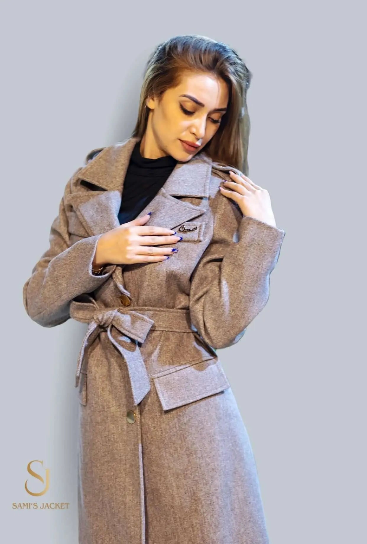 Elegant women's winter coat with a belt, perfect for stylish cold-weather fashion and comfort.