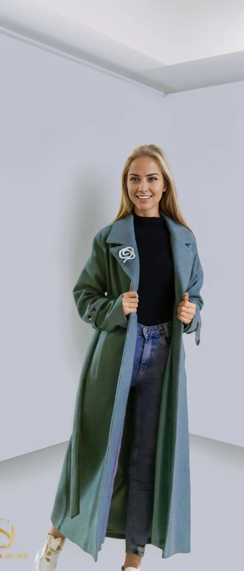 Elegant long winter coat in green, perfect for stylish women’s winter outfits, showcasing a blend of comfort and sophistication.