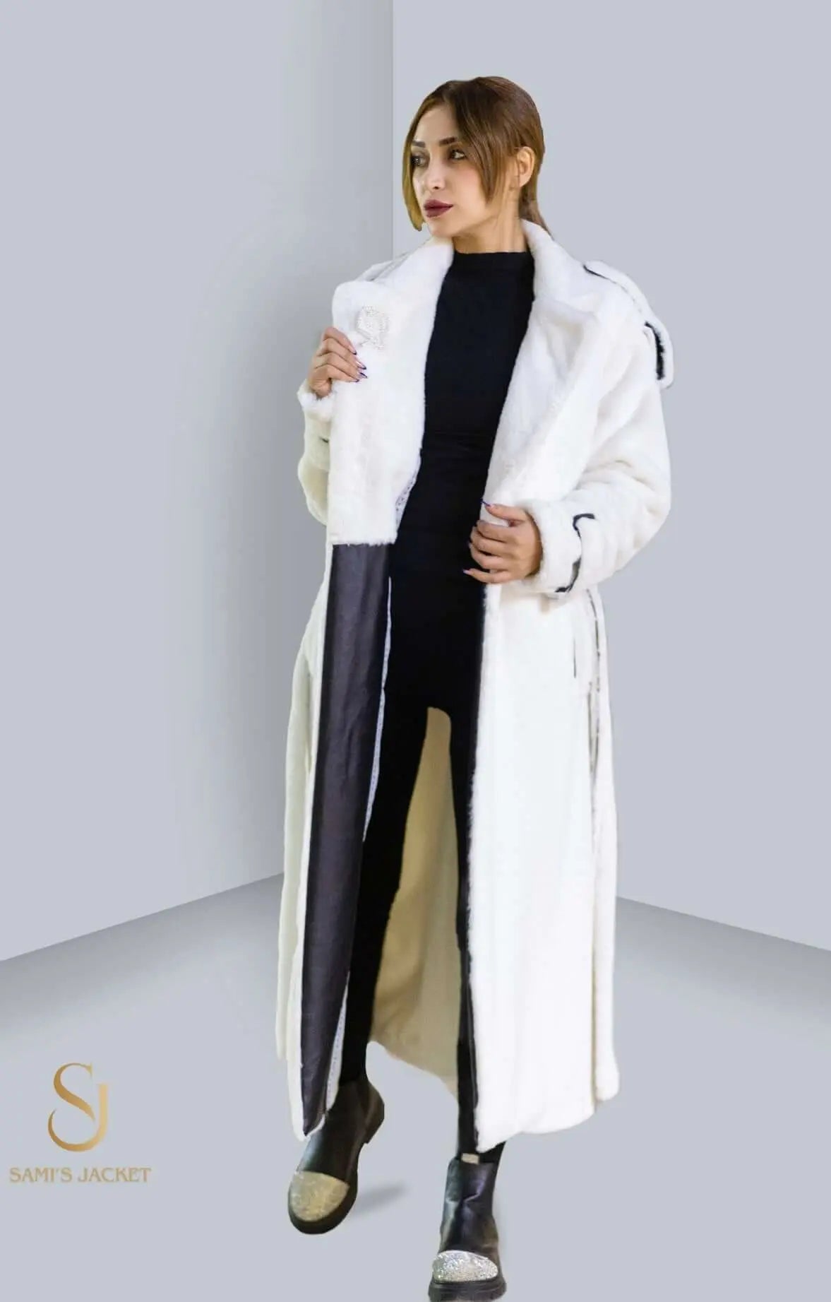 Chic white winter coat, perfect for women, showcasing warmth and style for cold weather fashion. Ideal for winter occasions.