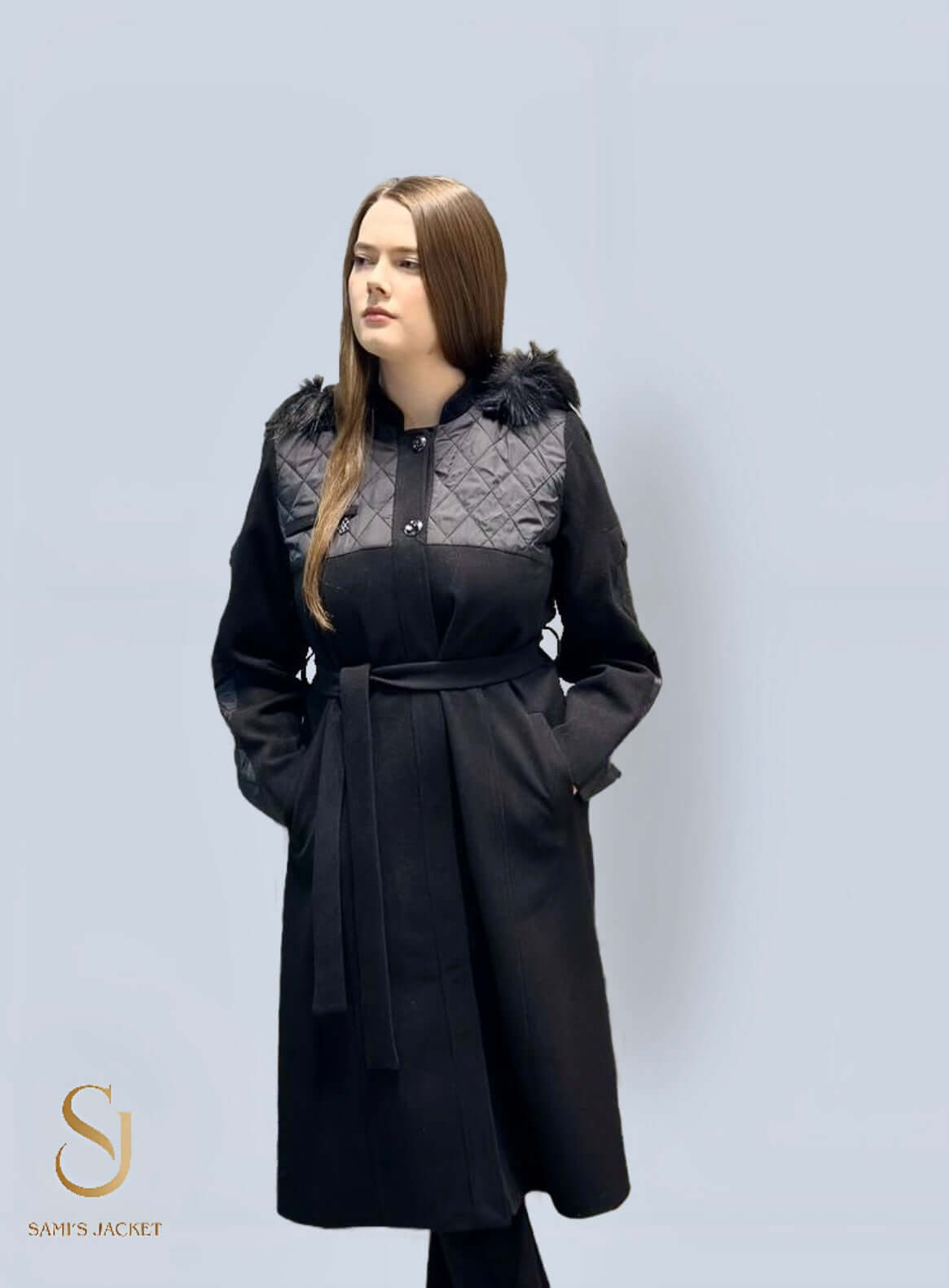 Stylish woman wearing a black winter jacket with quilted detailing and a hood, perfect for cold weather fashion.