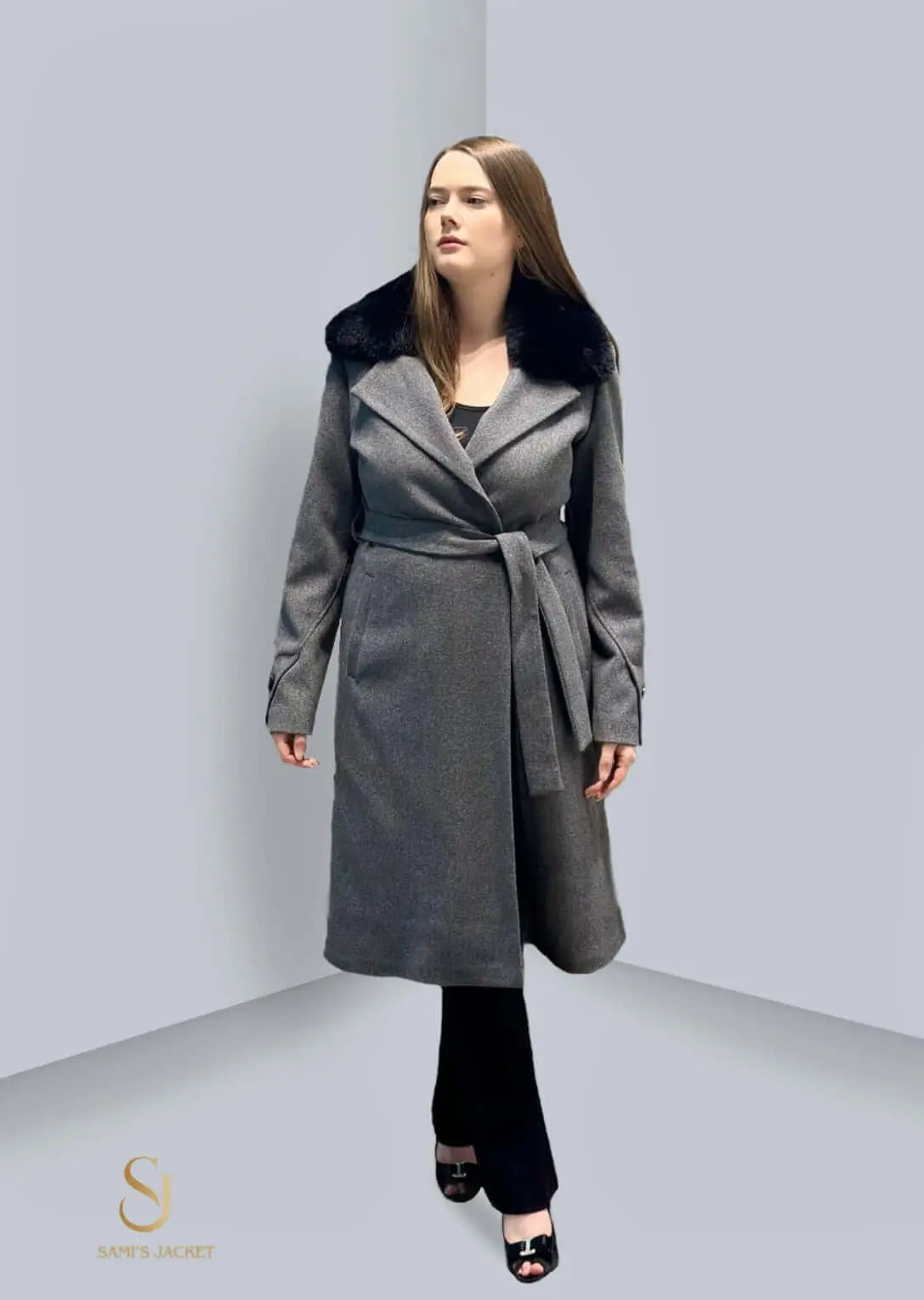 Stylish woman in a gray winter coat with fur collar, perfect for casual and formal occasions. Ideal for colder seasons.