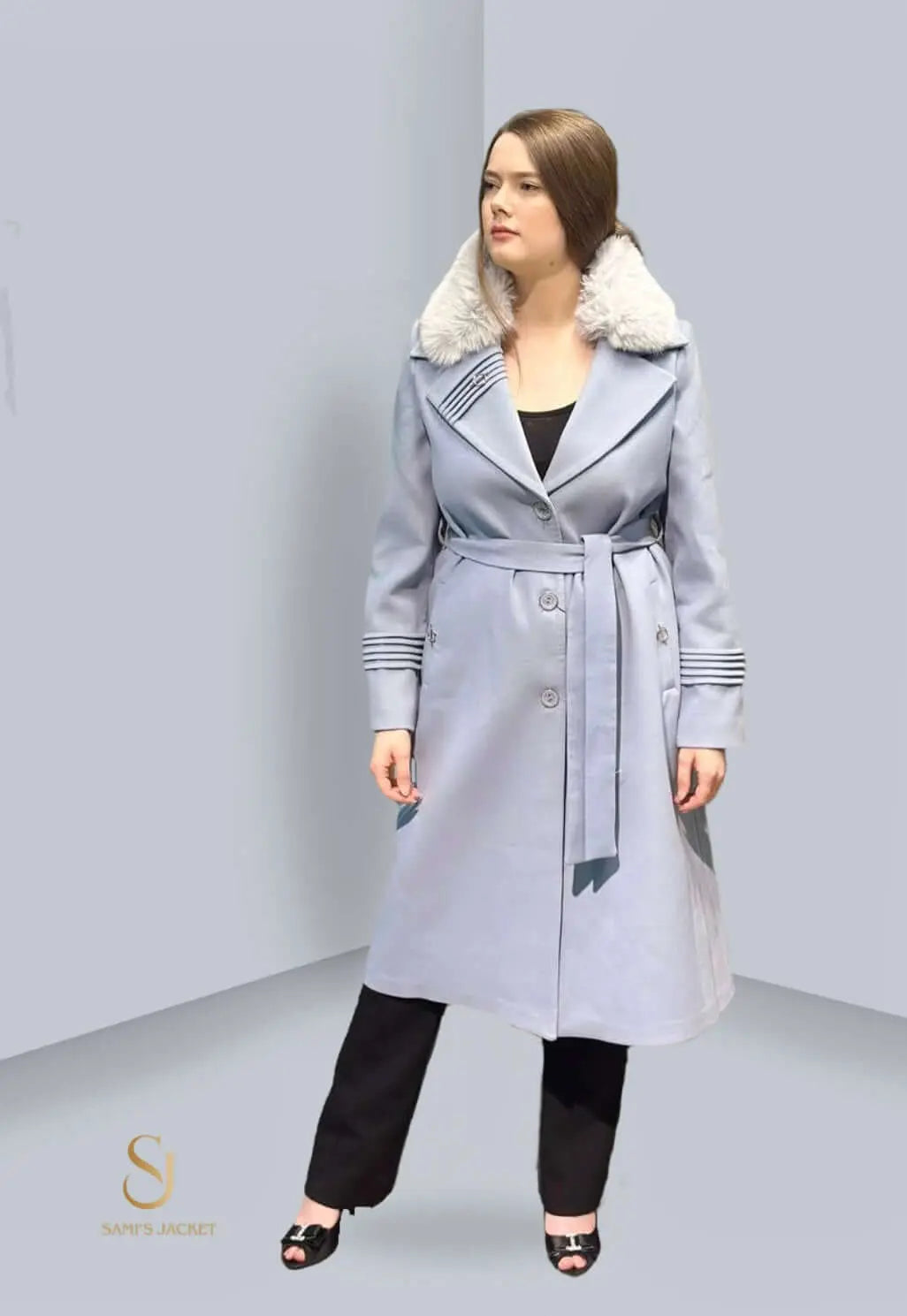 Stylish women's winter coat featuring a fur collar and belt, perfect for layering and colder seasons.