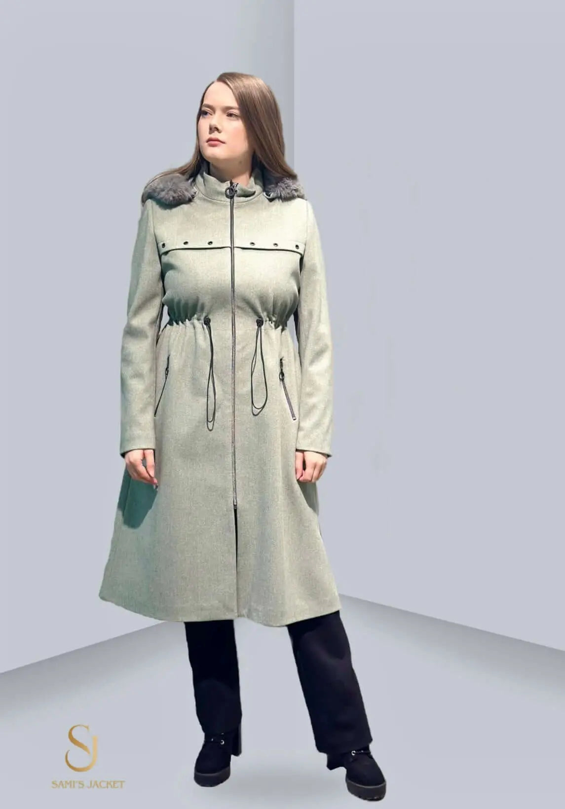 Stylish women's winter jacket in light green with drawstring waist and fur collar, perfect for cold weather outings.