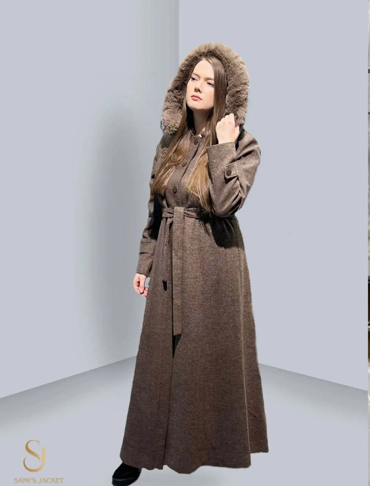 Stylish women's winter coat with a fur hood, perfect for cold weather, showcasing warmth and elegance.