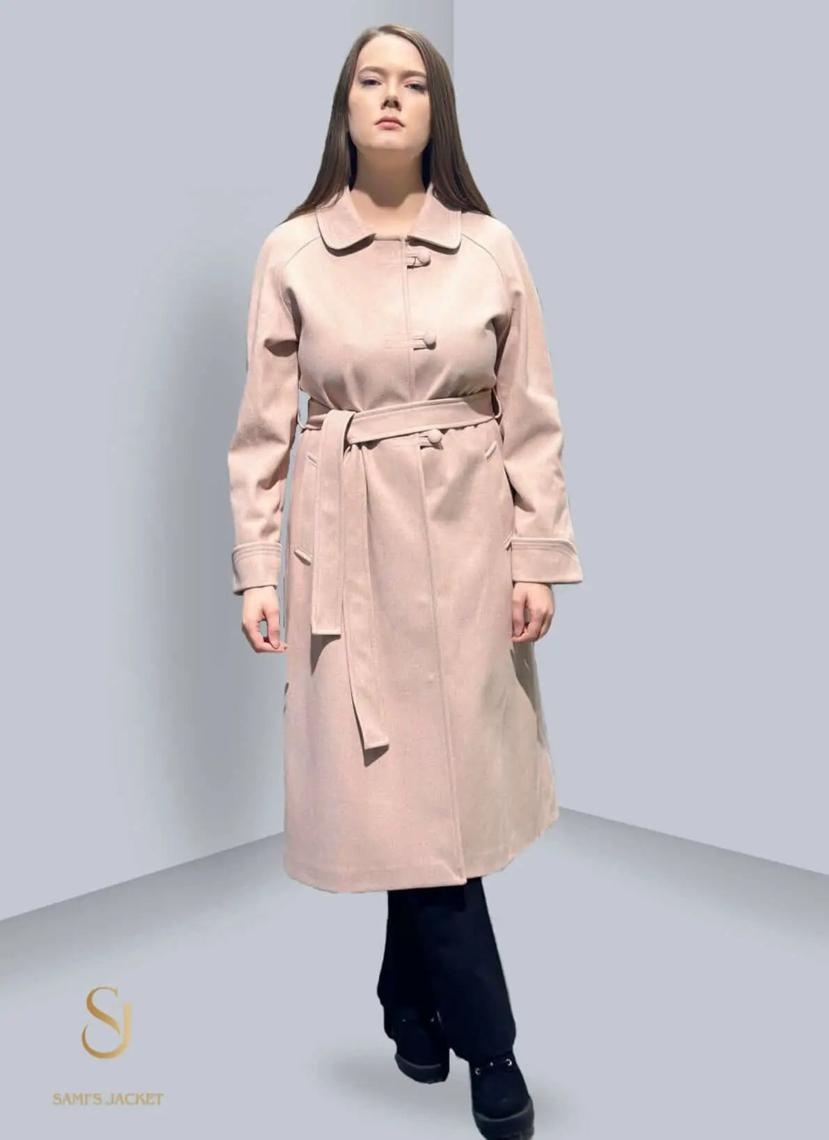 Fashionable women's belted jacket in soft pink, showcasing modern style and tailored design for winter outfits.