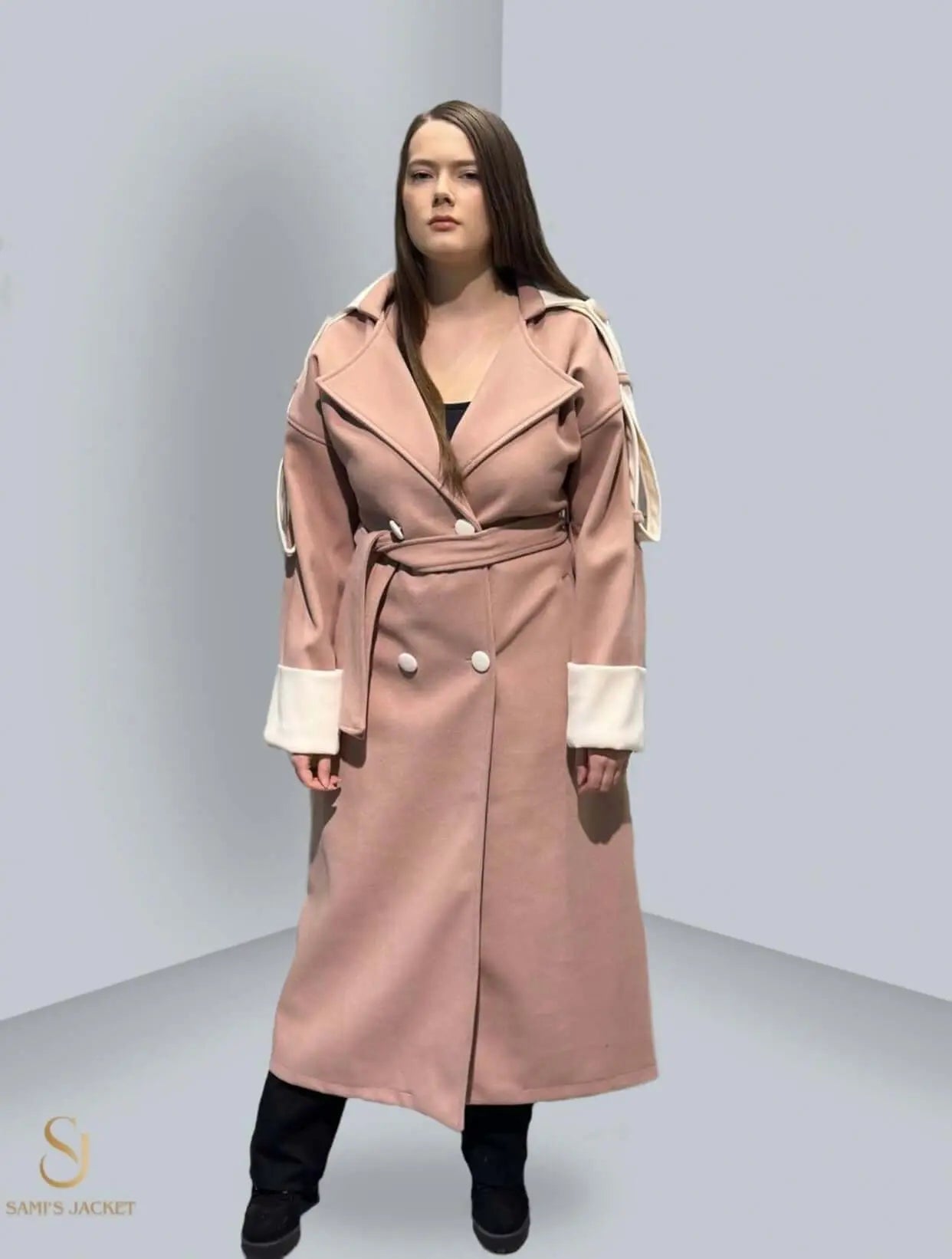 Elegant pink women's winter coat with a belted waist and contrasting sleeves, perfect for chilly weather and stylish outings.