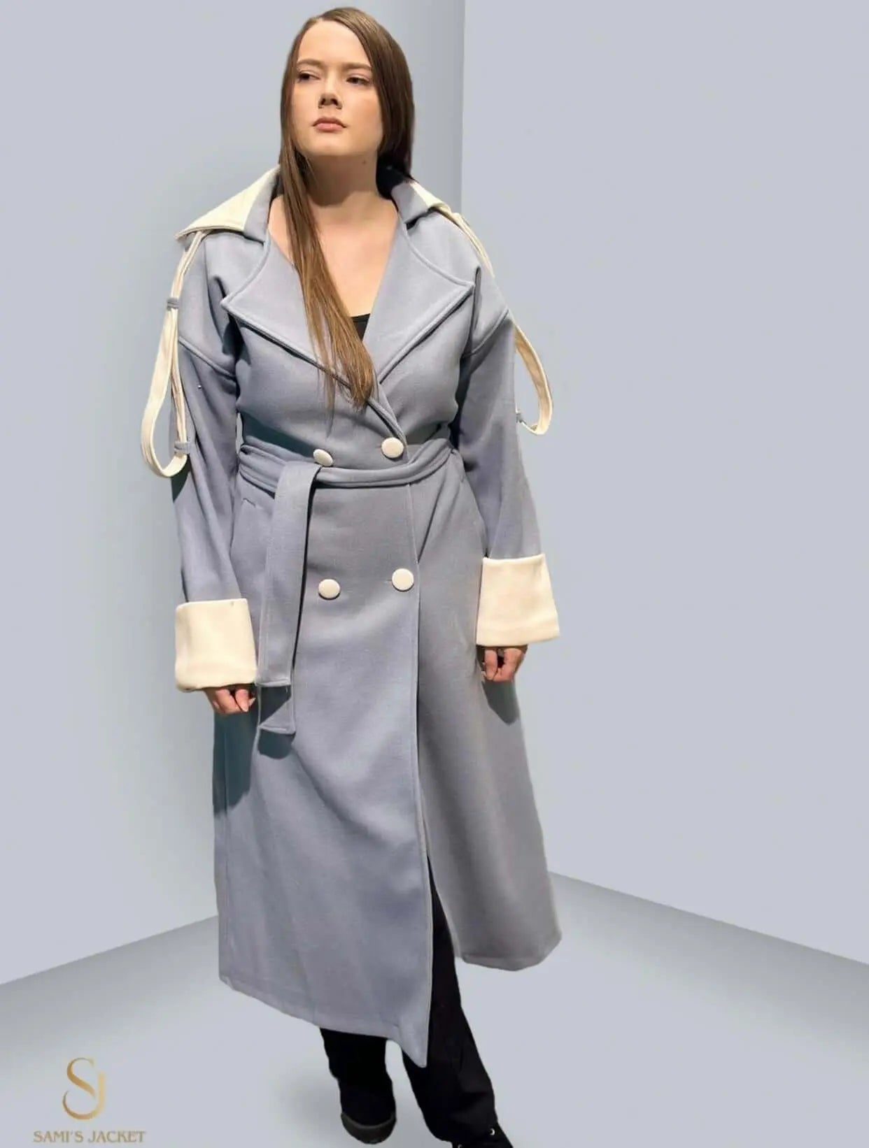 Elegant women's winter coat in light blue with stylish details, perfect for chic winter fashion.