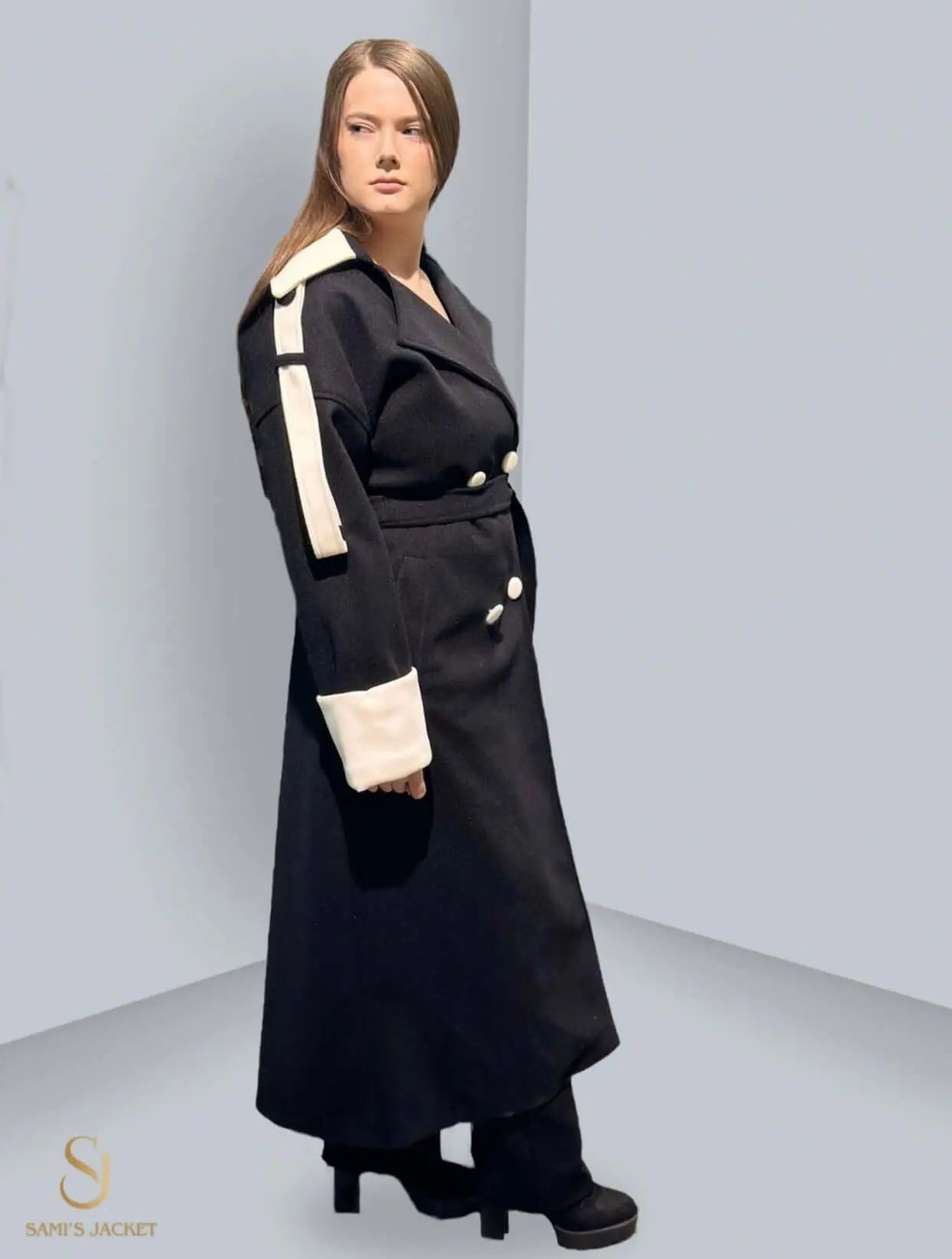 Elegant black winter coat featuring a sophisticated design and contrasting white accents, perfect for stylish women.