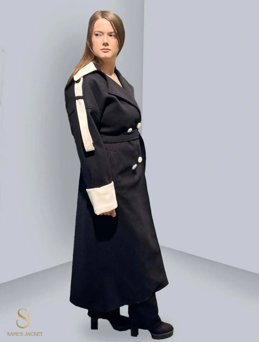 Elegant black winter coat featuring a sophisticated design and contrasting white accents, perfect for stylish women.