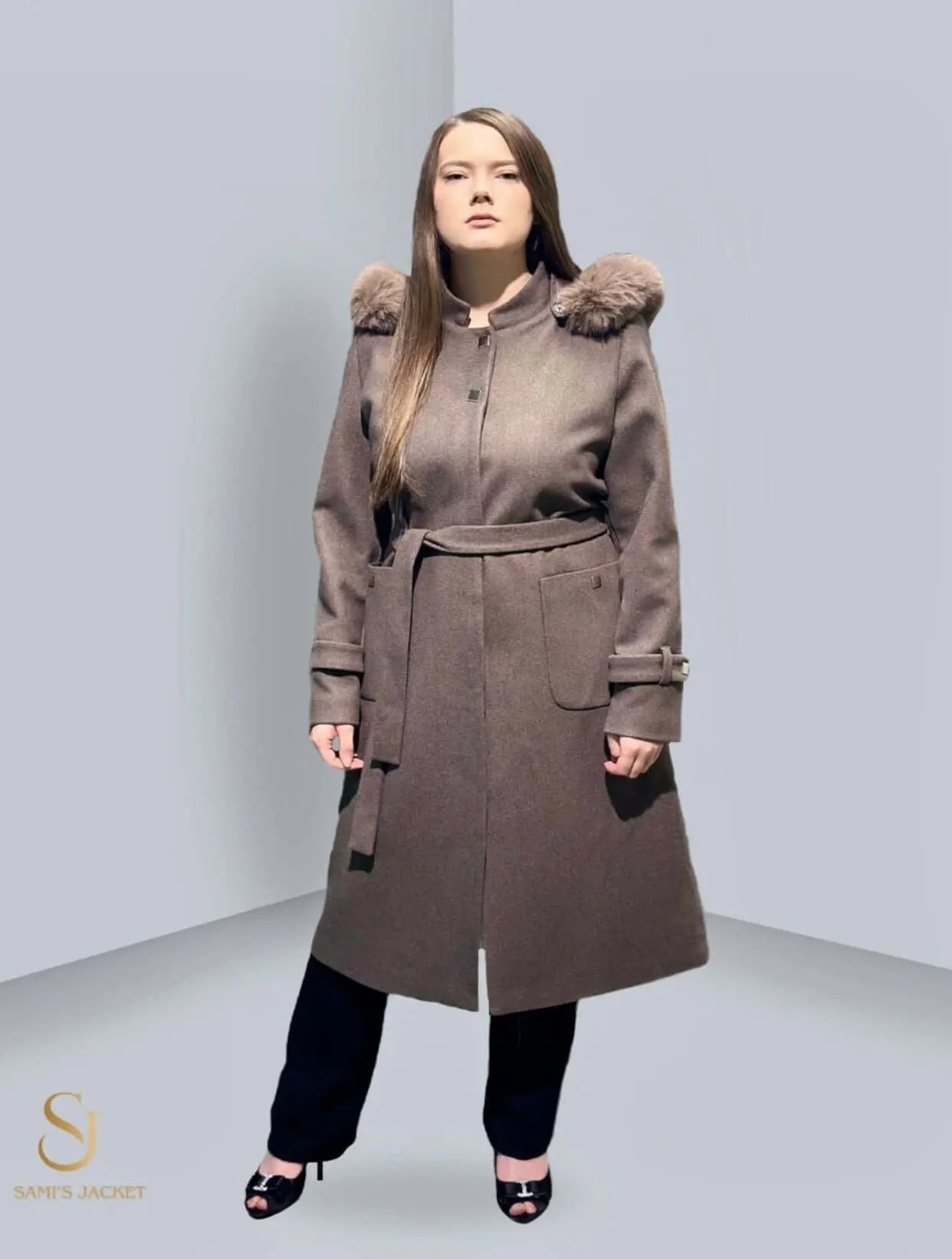 Stylish women's winter coat with fur accents, perfect for layering in cold weather, designed for comfort and elegance.