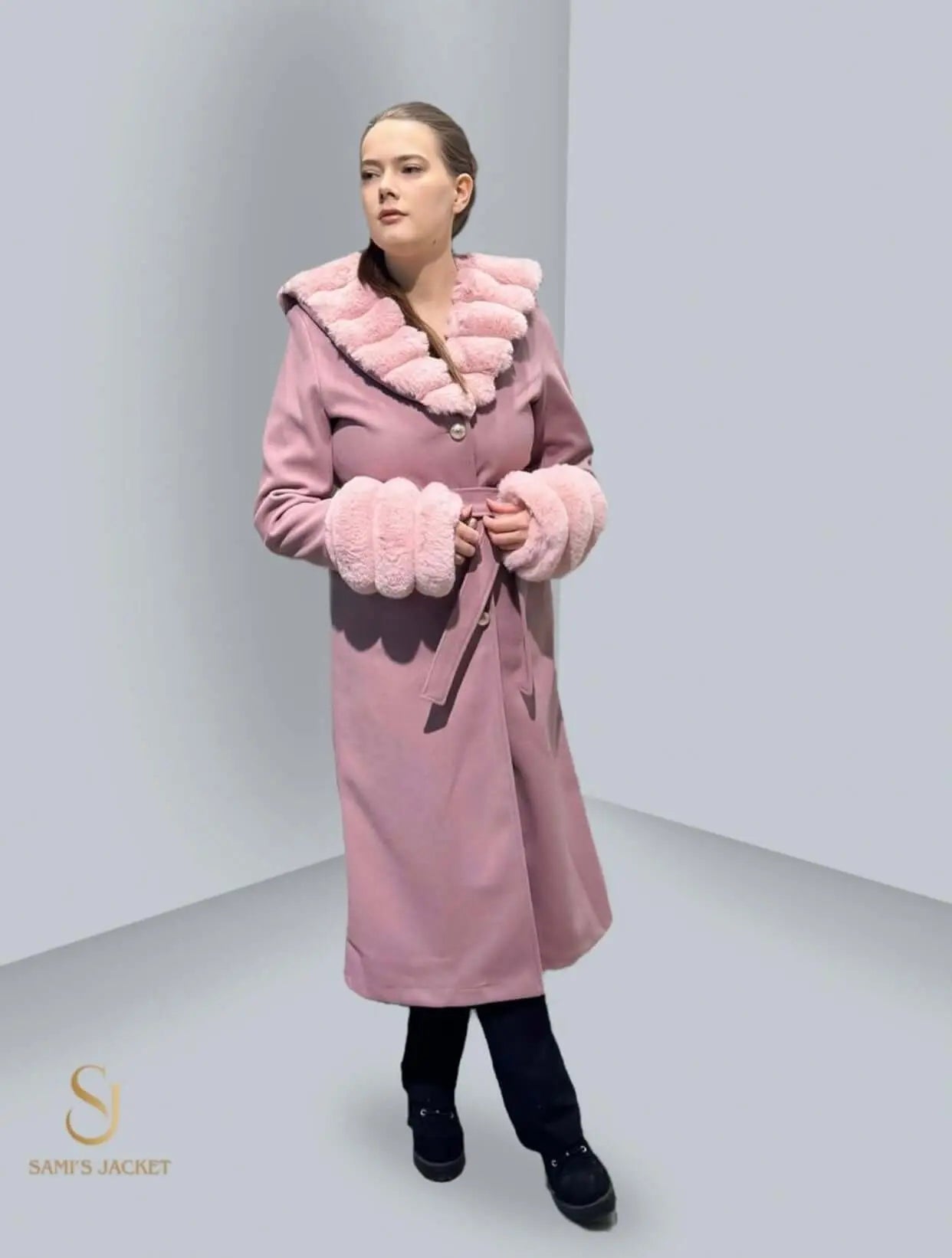 Elegant pink winter coat with a fluffy collar and cuffs, perfect for stylish winter fashion for women.