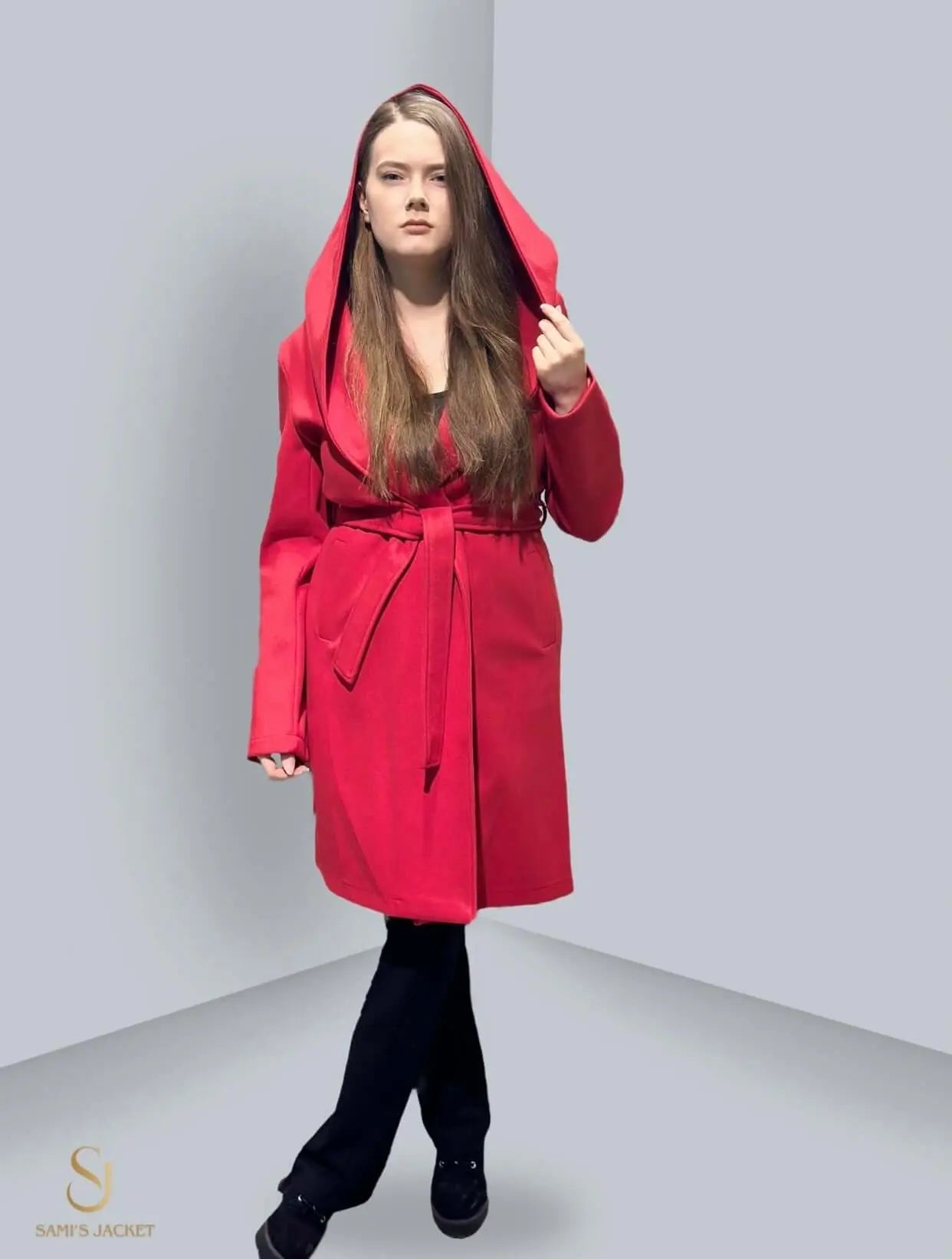 Stylish red winter jacket with a hood, perfect for women, showcasing a flattering silhouette and practical design for cold weather.