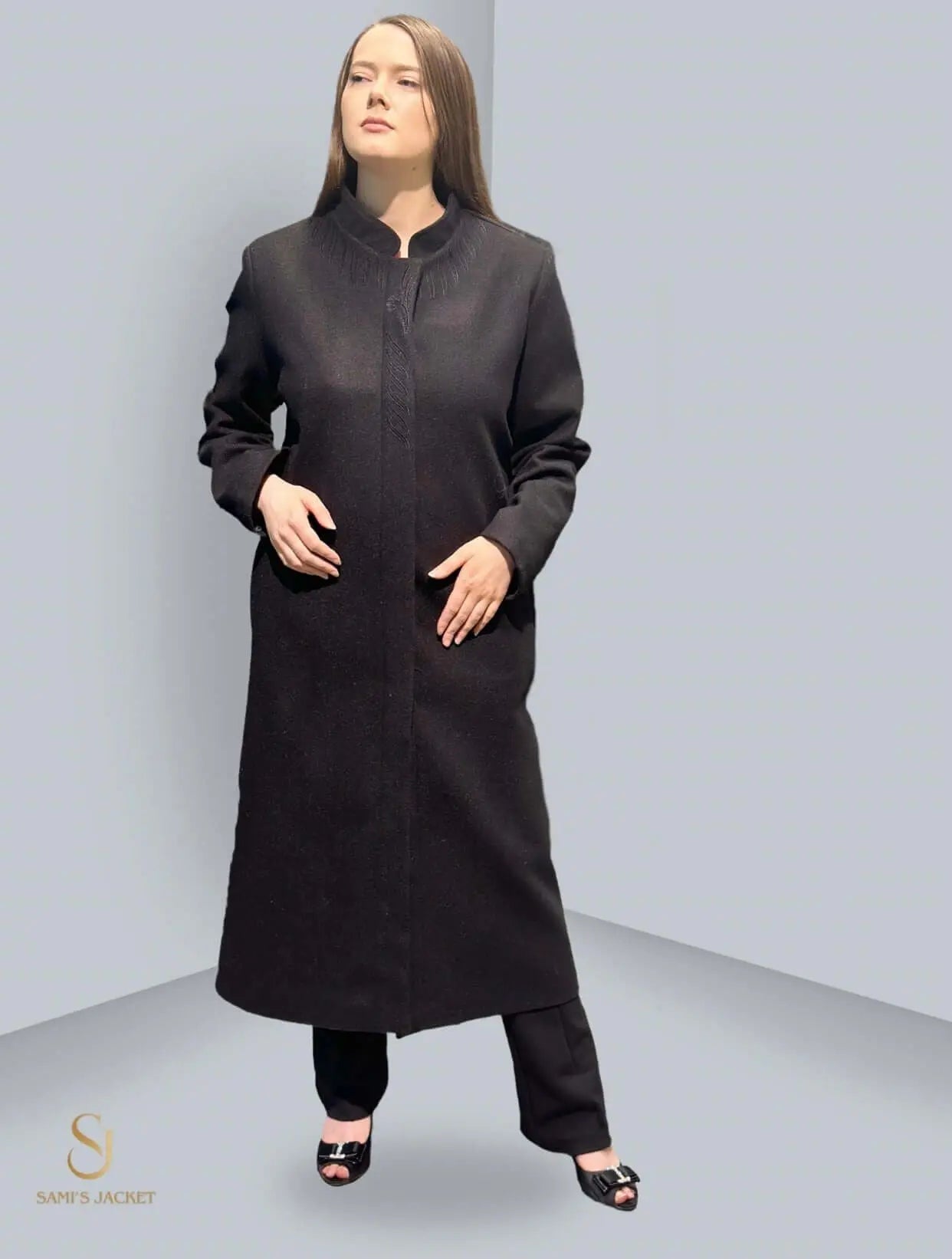 Elegant long black coat for women, perfect for winter fashion and versatile styling options. Ideal for cold weather and special occasions.