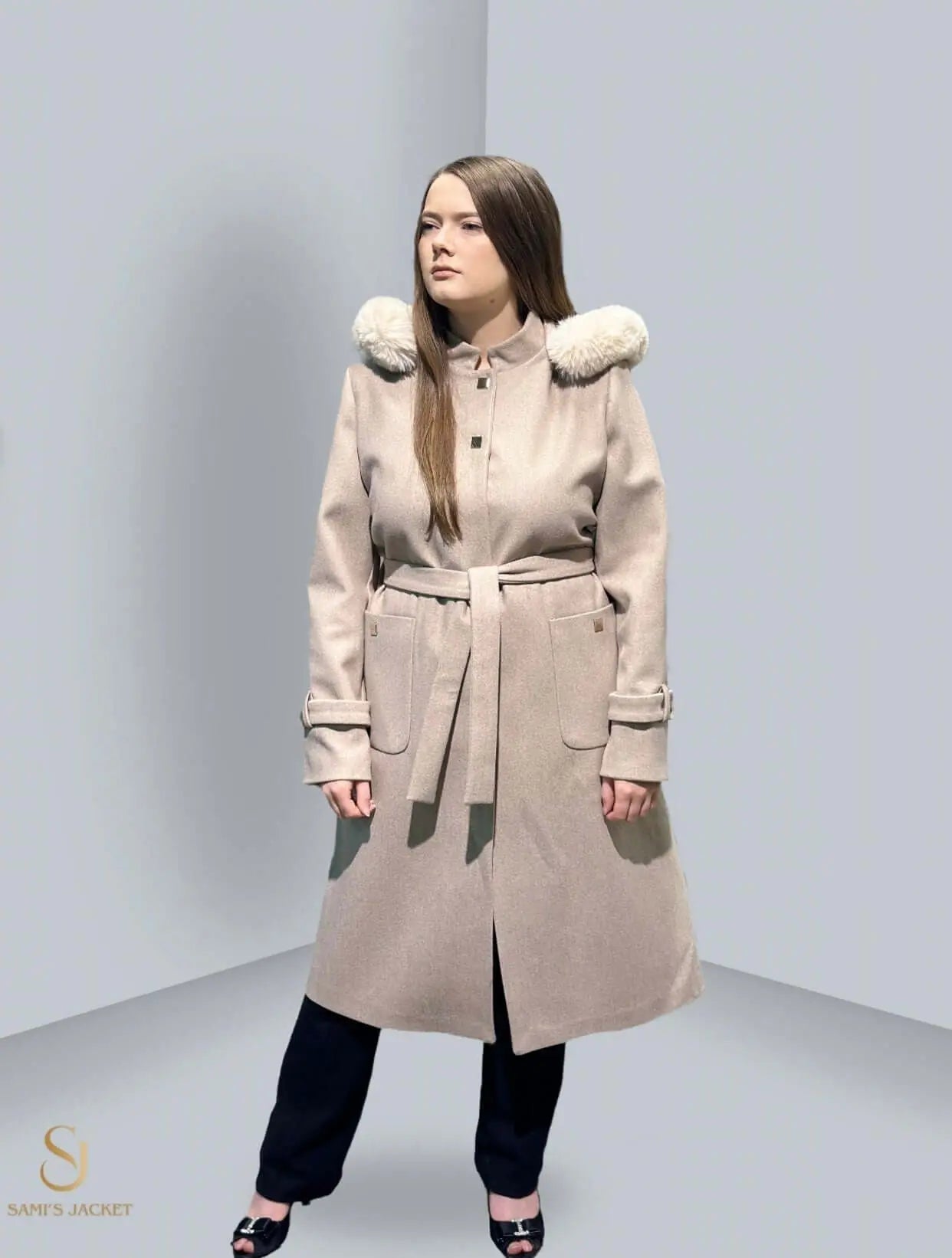 Model 1013 stylish hooded winter jacket in light beige, perfect for women, featuring a belted waist and cozy fur collar.