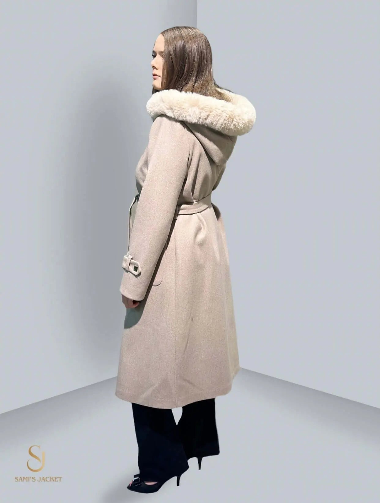 Women's stylish hooded winter jacket with fur collar, perfect for layering in colder seasons.