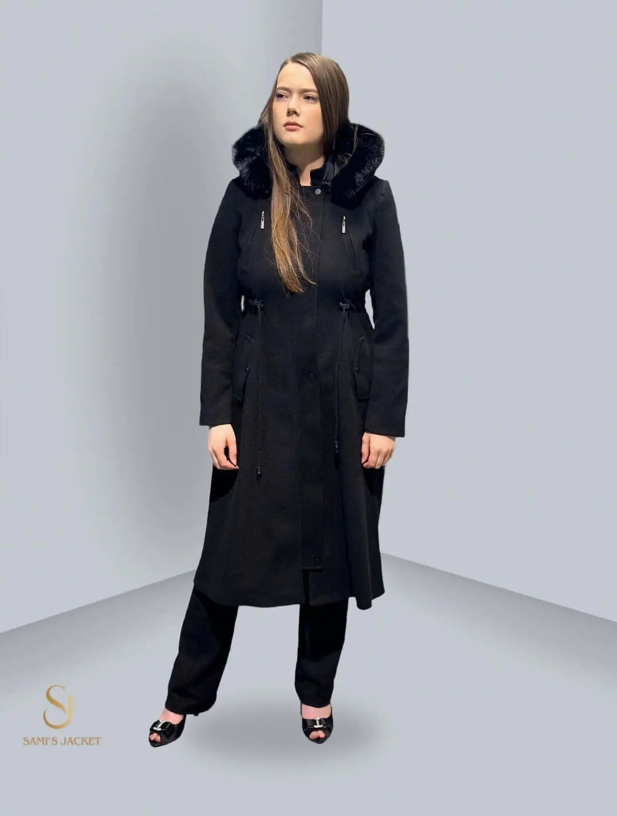 Stylish black winter coat with faux fur hood, perfect for women seeking trendy and practical winter fashion.