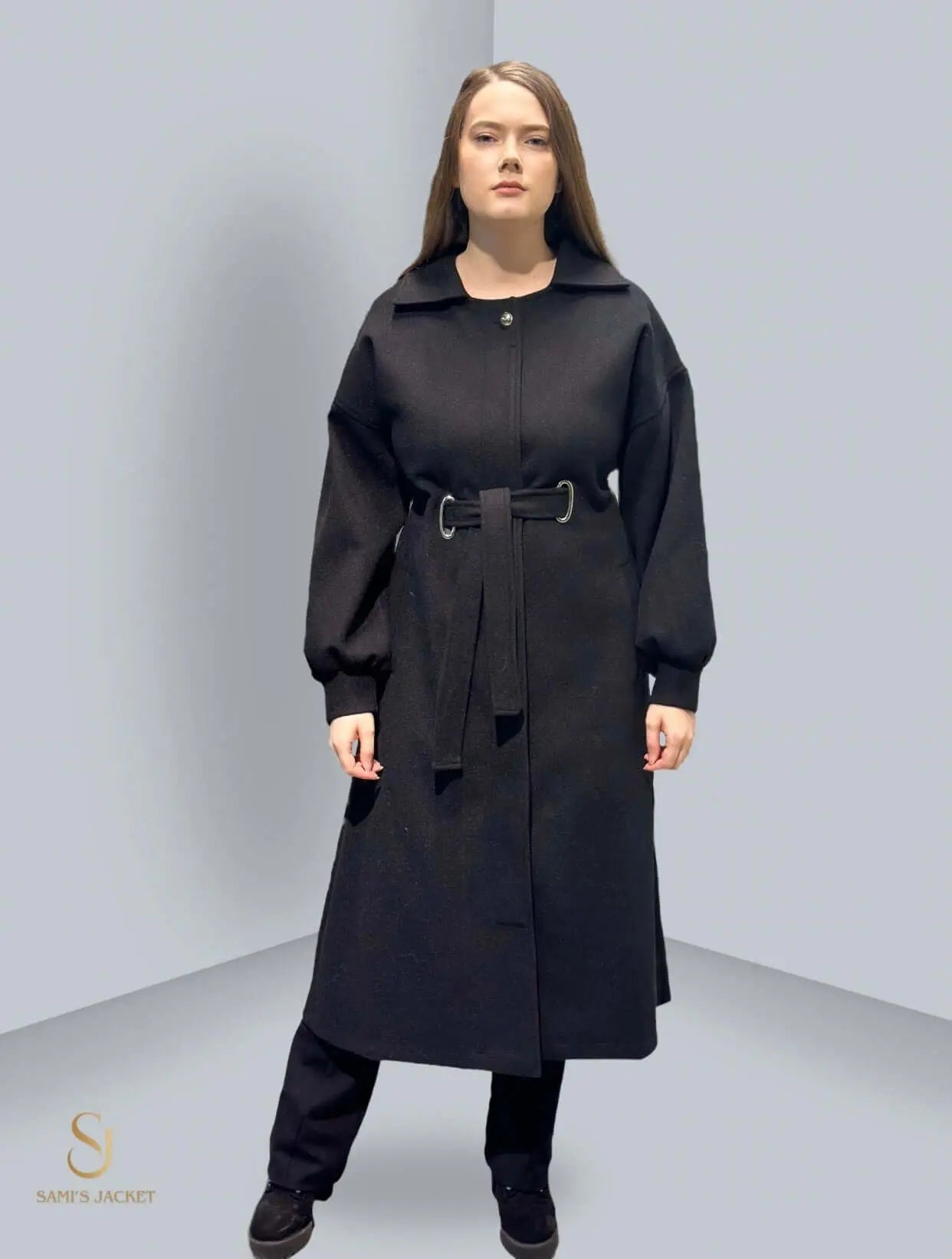 Model 1030 long winter coat in black, featuring a belted waist and elegant silhouette, perfect for stylish winter outfits.