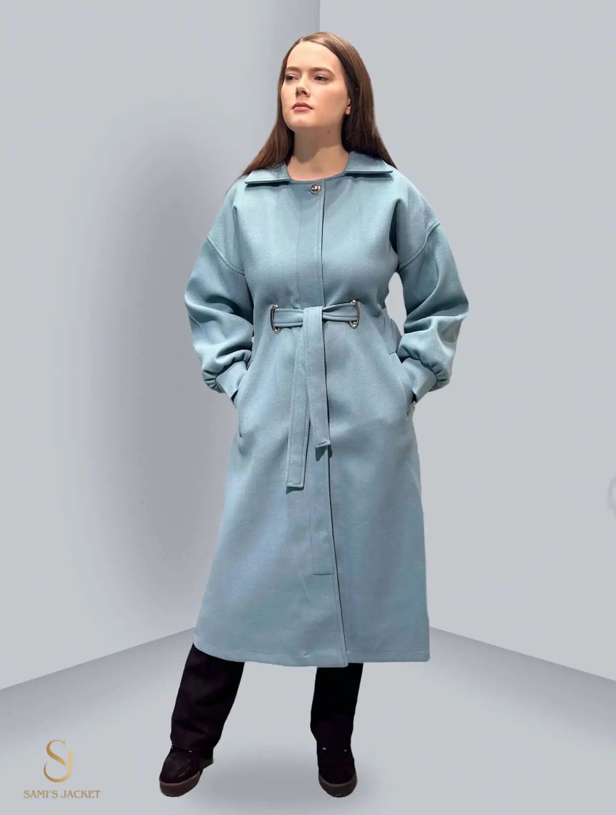 Elegant model wearing a long blue winter coat, showcasing stylish design and flattering silhouette, perfect for women.