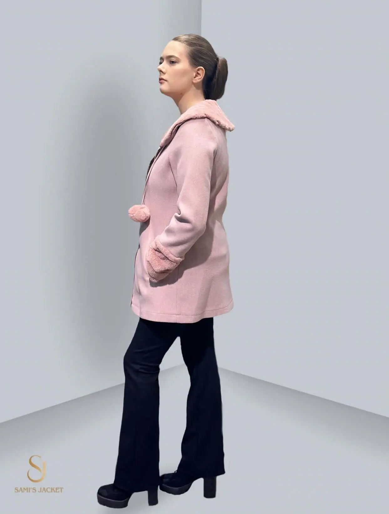 Stylish pink winter jacket with faux fur collar, paired with black pants, perfect for trendy women's winter fashion.