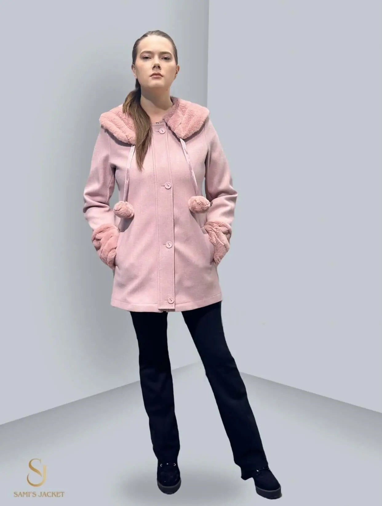 Stylish pink winter jacket with a hood and pom-poms, perfect for casual and formal occasions for women.