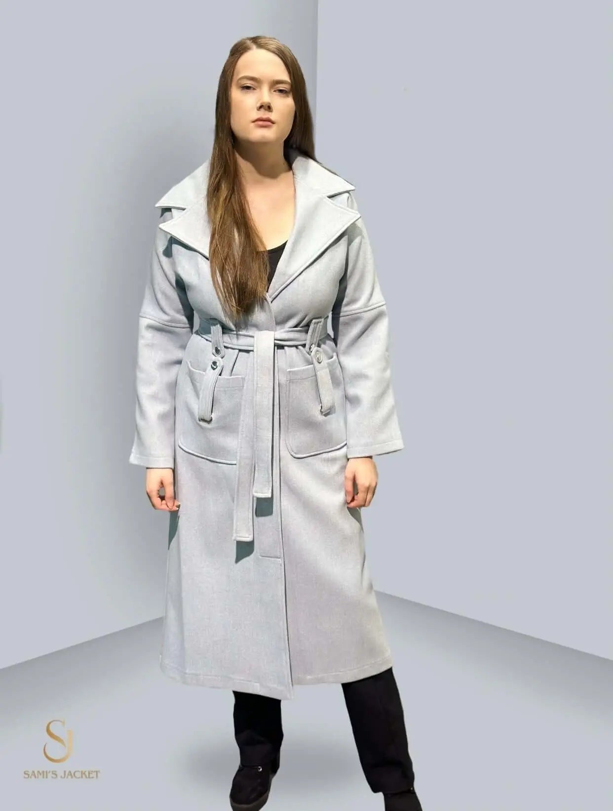 Model 1034 stylish winter coat for women in a light color, featuring a belted design and elegant silhouette. Ideal for formal occasions.