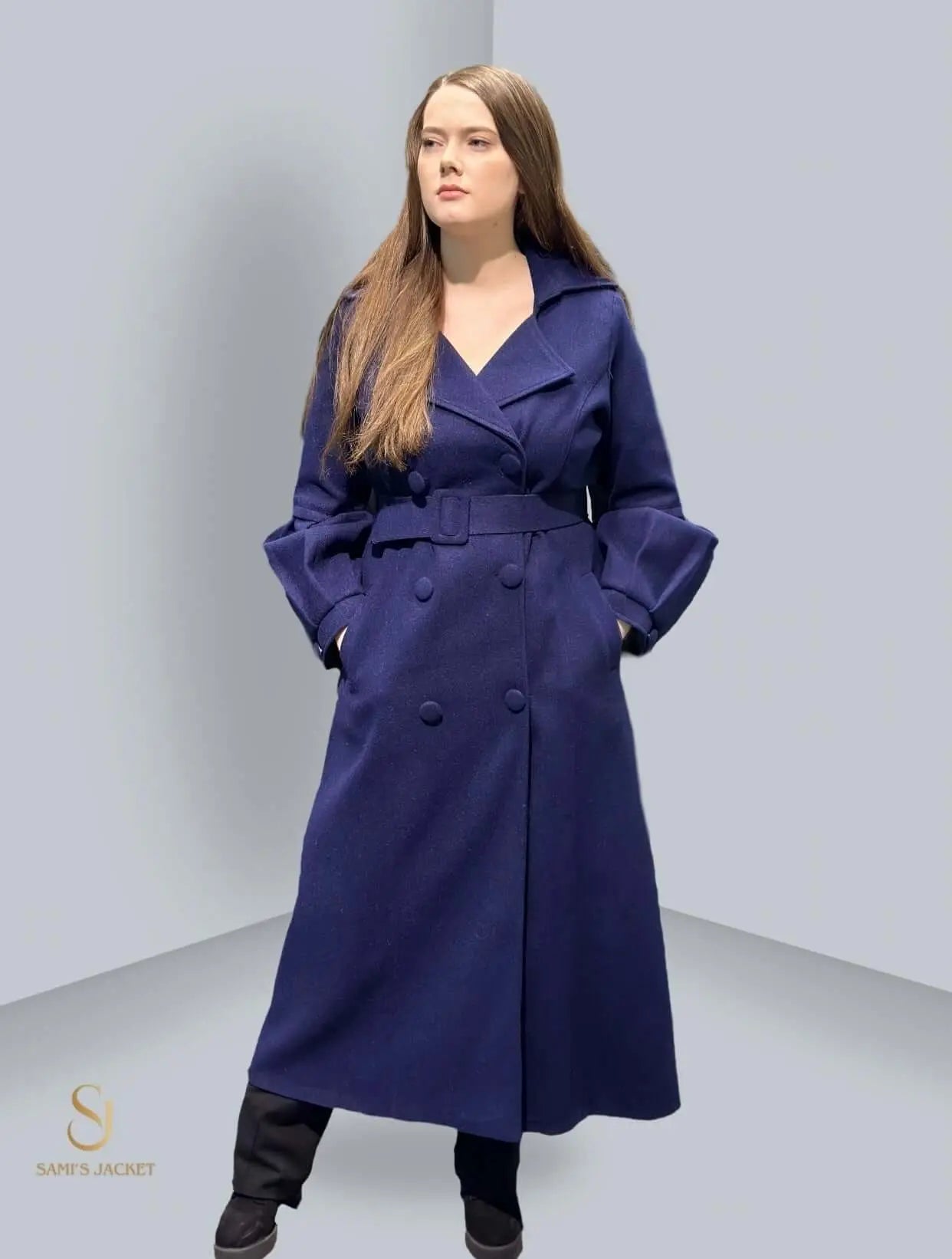 Woman in a stylish blue winter coat, showcasing elegance and warmth, ideal for modern women's winter fashion.